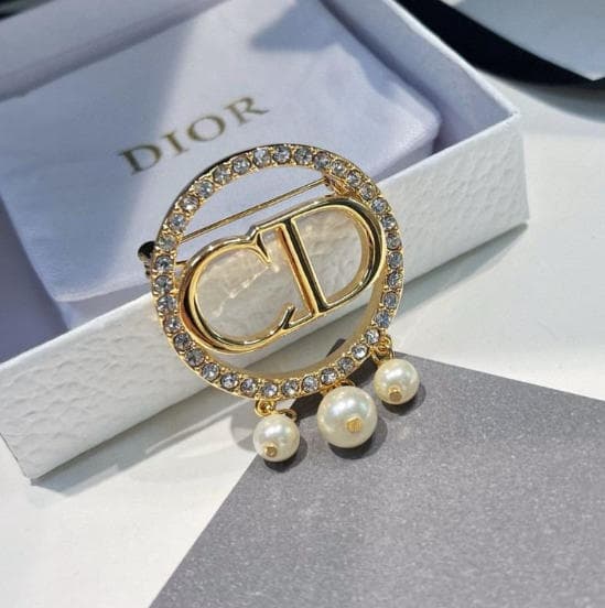 Cd Brooch Original mirror-finish stainless steel (stamped/branded)